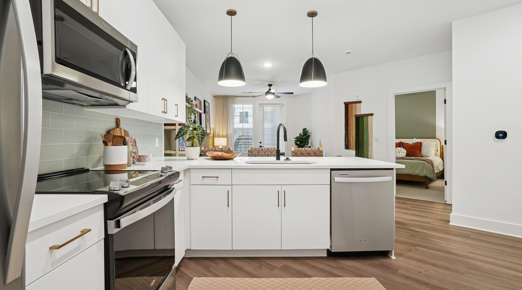 Kitchen with white cabinets and stainless steel appliances in Charlotte, NC