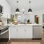 Kitchen with white cabinets and stainless steel appliances in Charlotte, NC
